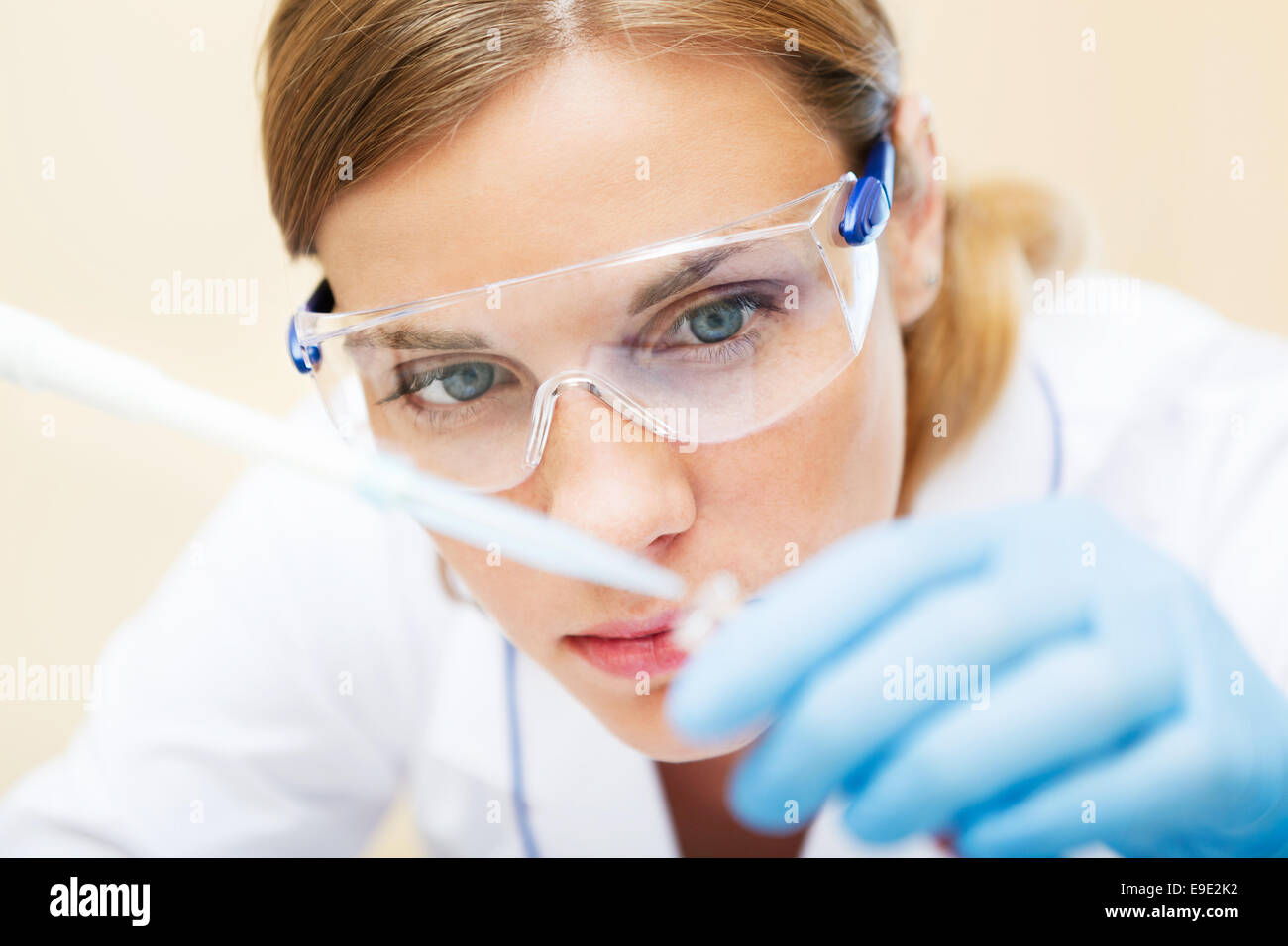 Young beautiful scientist working with samples in lab Stock Photo - Alamy