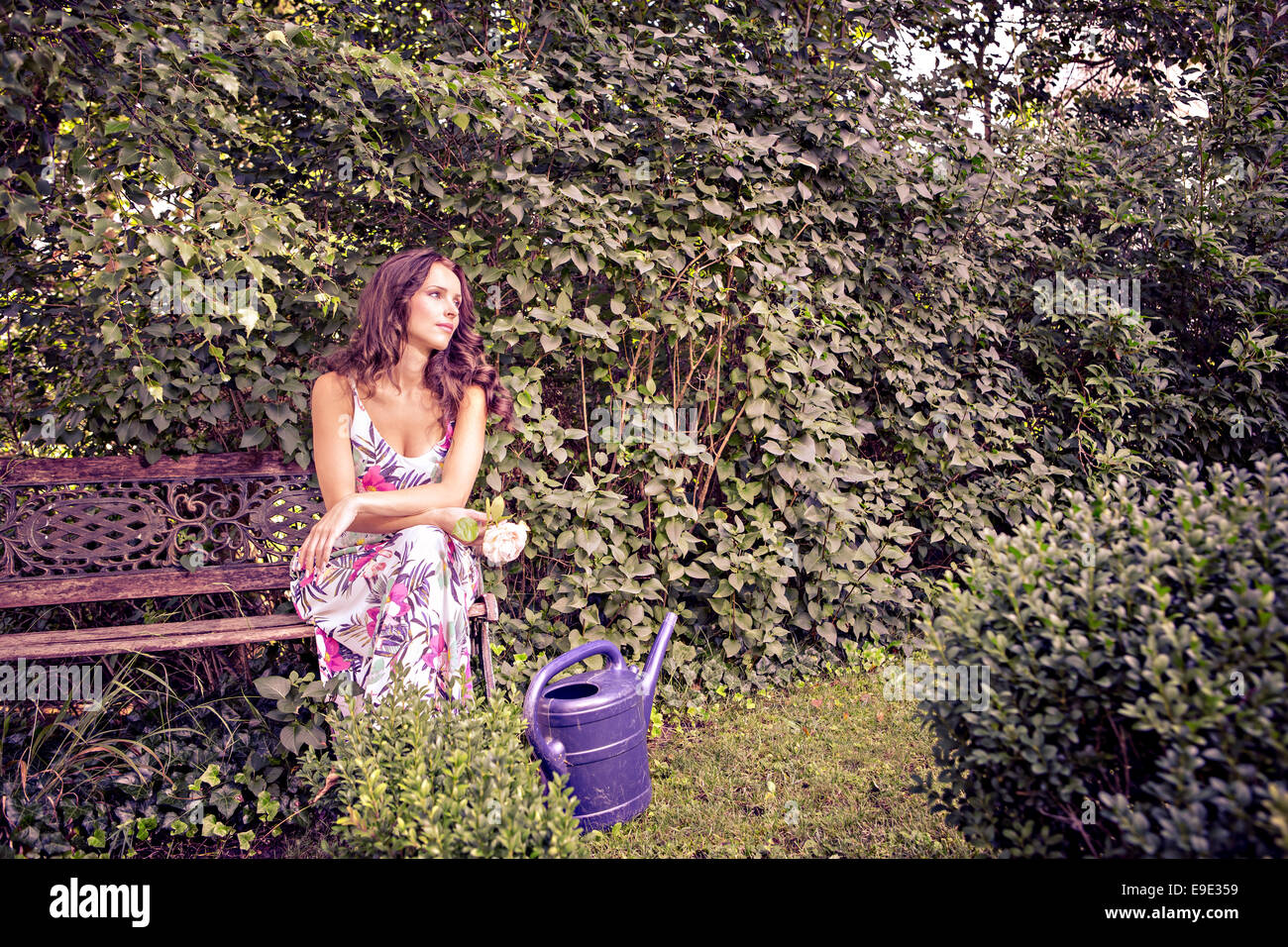 portrait of a young woman in the garden Stock Photo - Alamy