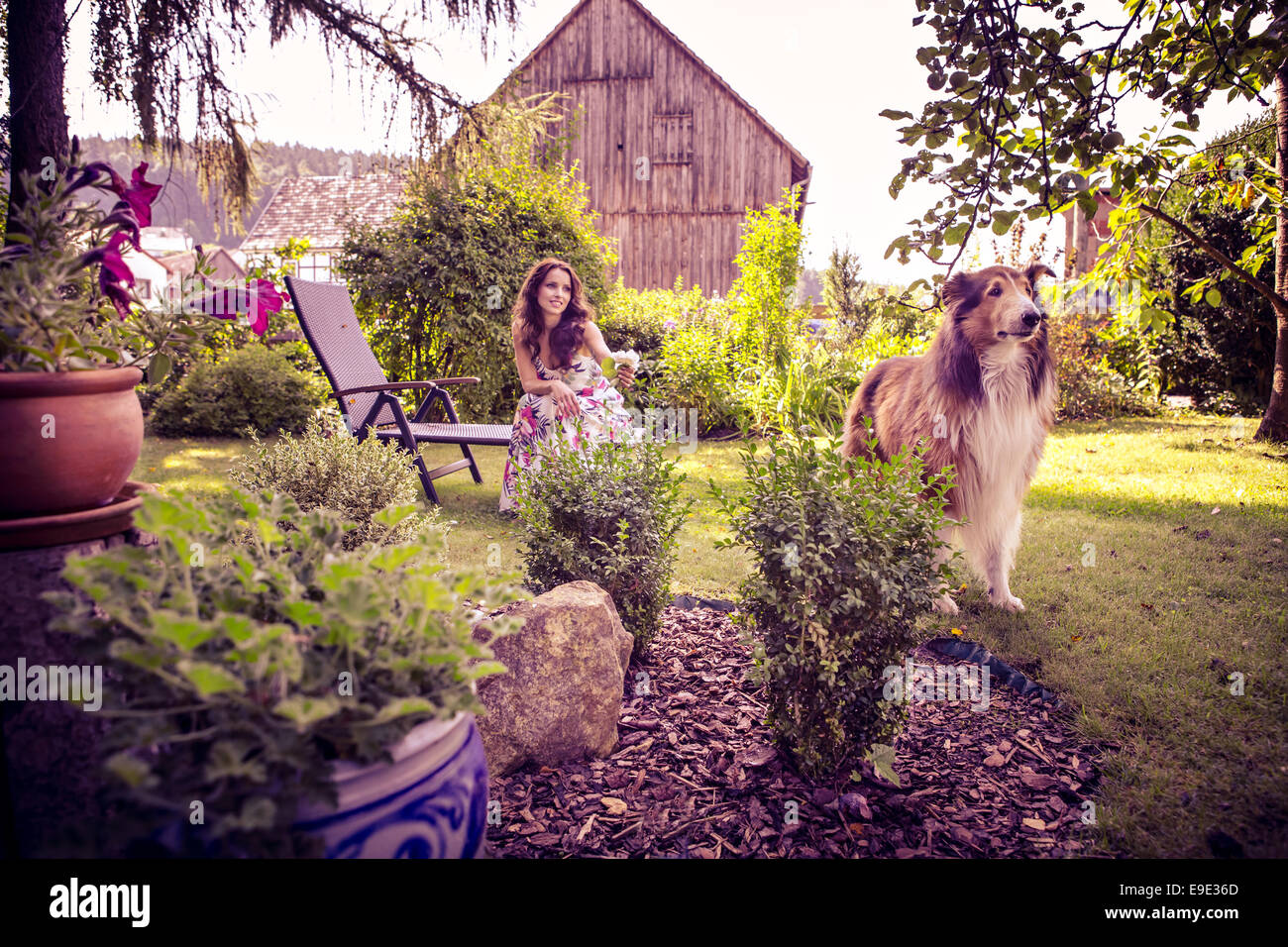 portrait of a young woman in the garden Stock Photo - Alamy