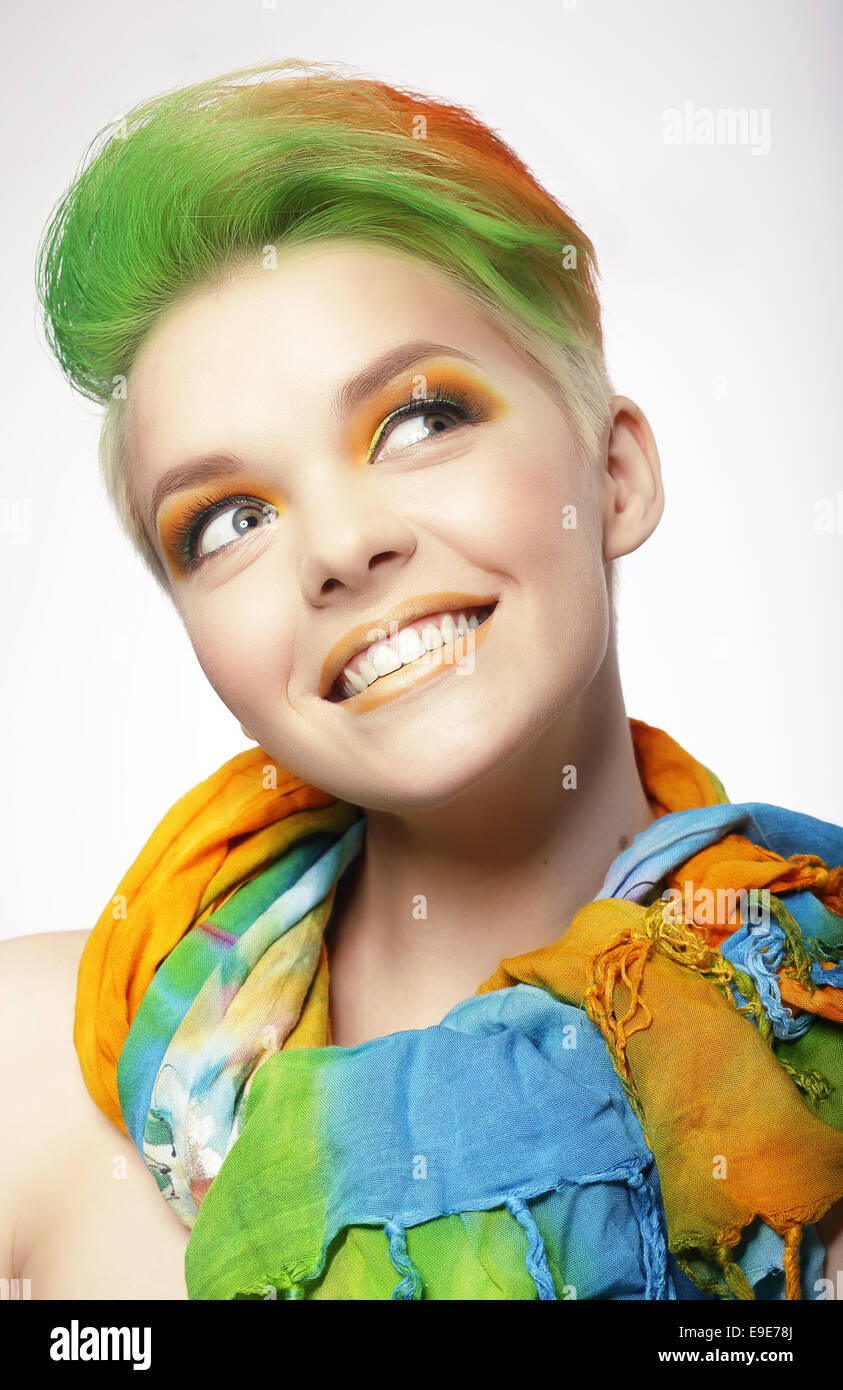 Funny Smiling Woman with Colored Hairs Looking Up Stock Photo