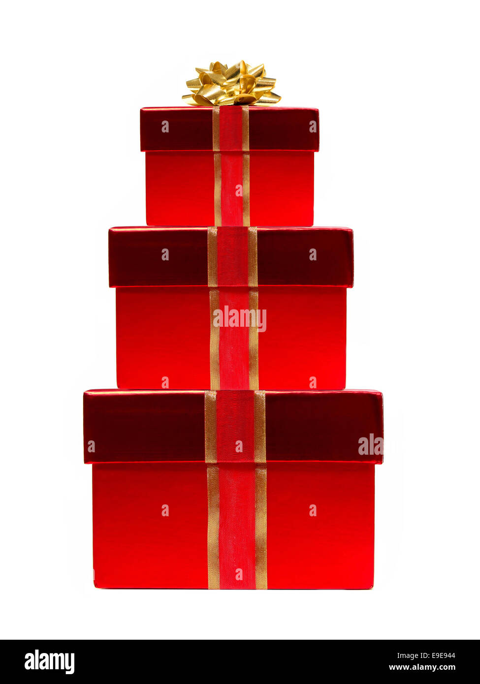 Stack of red gift boxes with ribbon and gold bow isolated on white ...