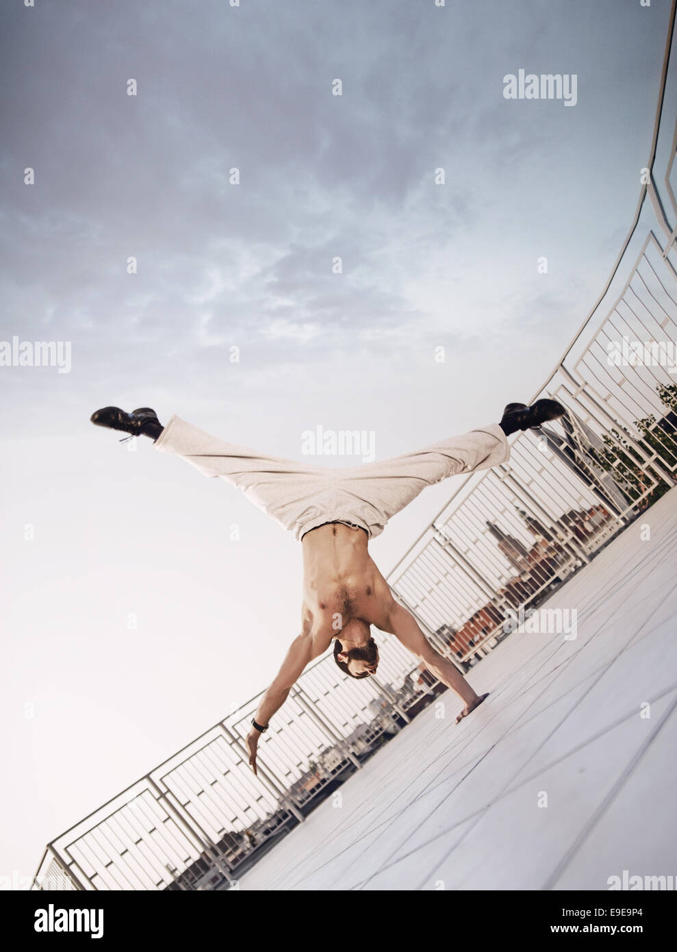 Muscular guy doing very hard exercises Stock Photo Alamy