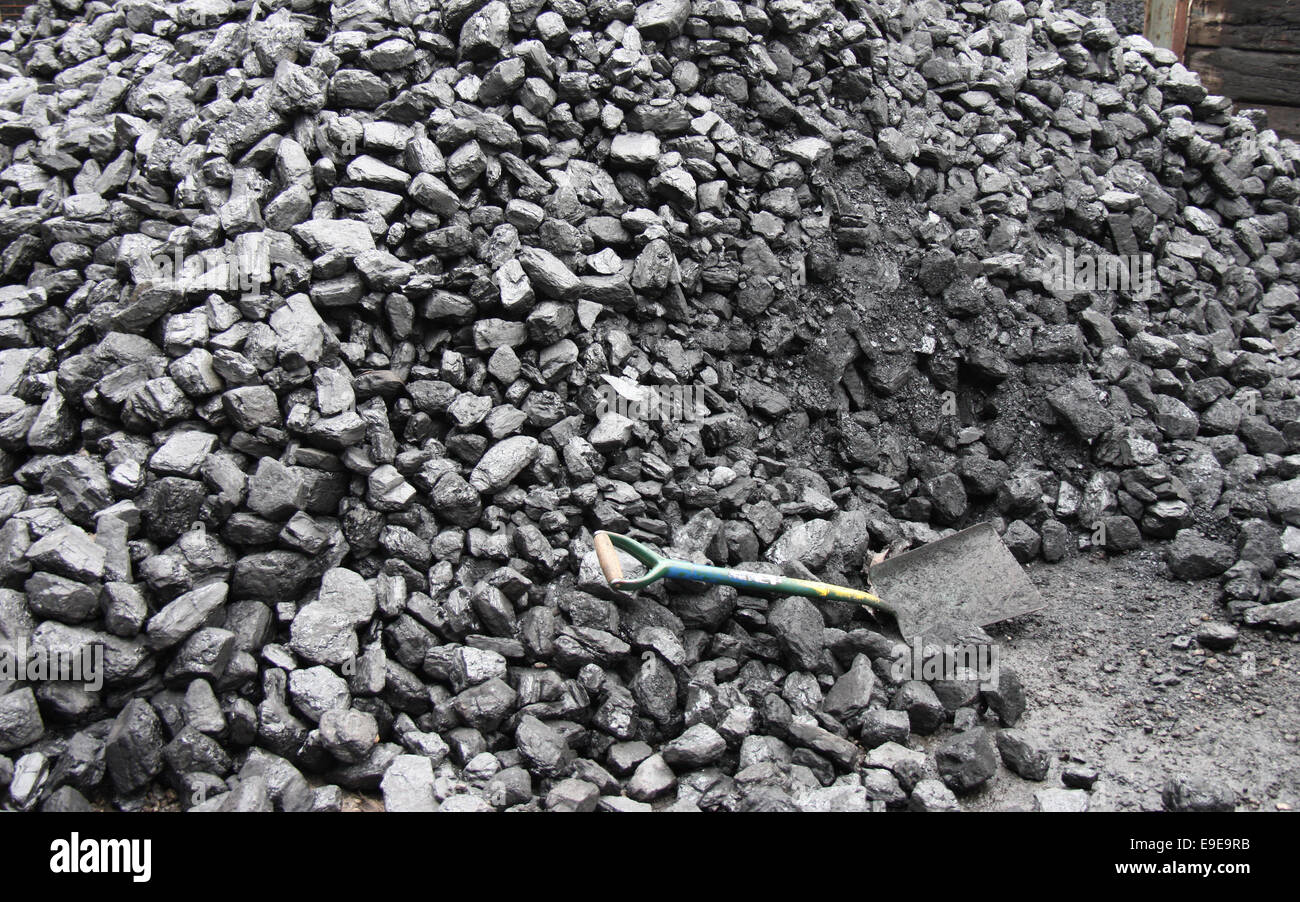 A Large Pile of Coal with a Shovel Stock Photo Alamy