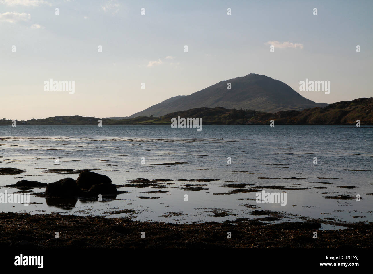 Barnaderg Bay, Ballynakill Harbour, with Tully Mountain in the background, Letterfrack, Connemara, County Galway, Ireland Stock Photo