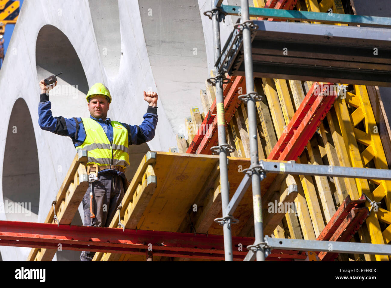 Scaffolding and construction of building, strong man scaffolding construction worker Stock Photo