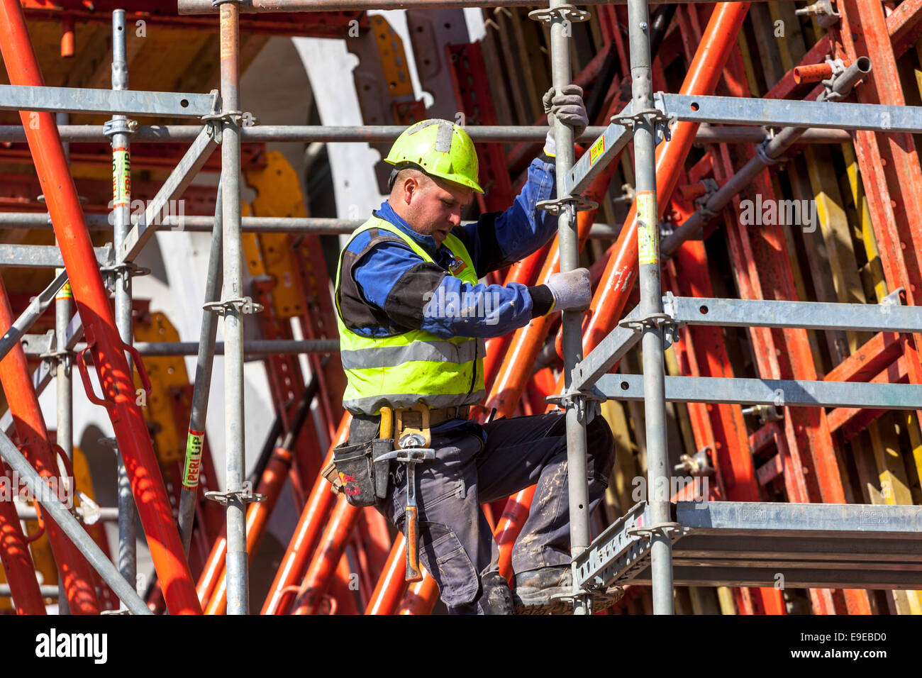 Scaffolding construction worker building Stock Photo
