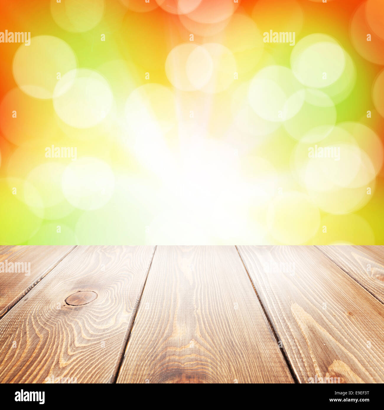 Autumn nature background with wooden table and blurred sunny bokeh ...