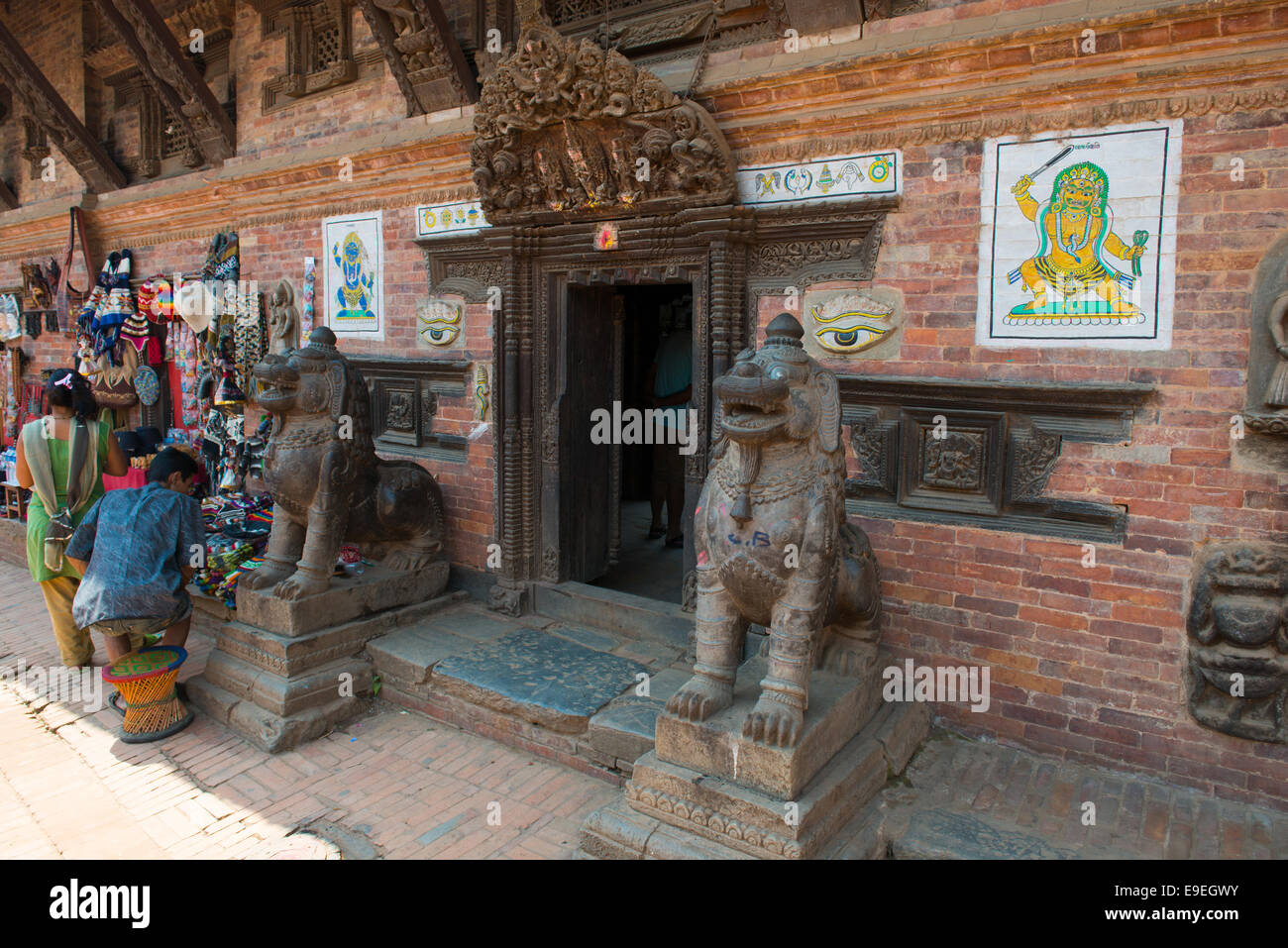 Entrance to the privat temple near Durbar square of Bhaktapur on May 09, 2014. Bhaktapur is a 'cultural gem' in Nepal. Stock Photo