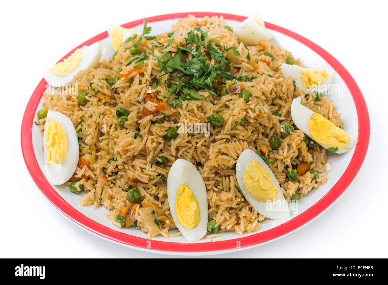 Englishstyle breakfast kedgeree, a meal of rice, smoked fish, eggs and vegetables Stock Photo