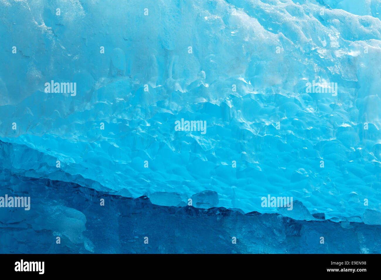 Closeup of blue glacial ice on iceberg floating in Tracy Arm, Southeast