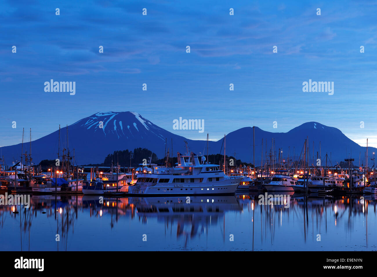 Boats in marina at New Thomsen Harbor with Mount Edgecomb in background, Sitka Harbor, Alaska, USA Stock Photo