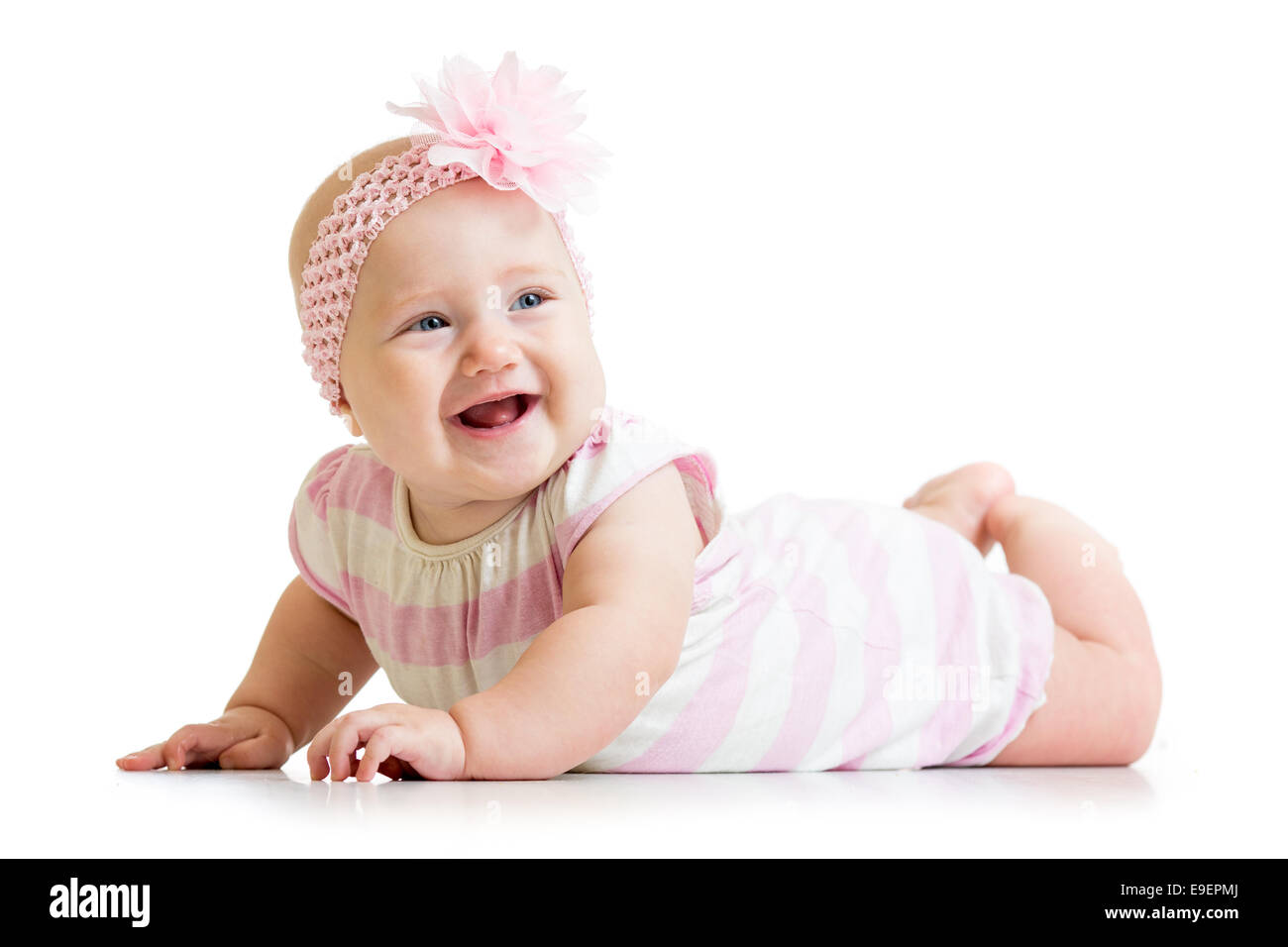 lying smiling baby girl isolated on white background Stock Photo - Alamy
