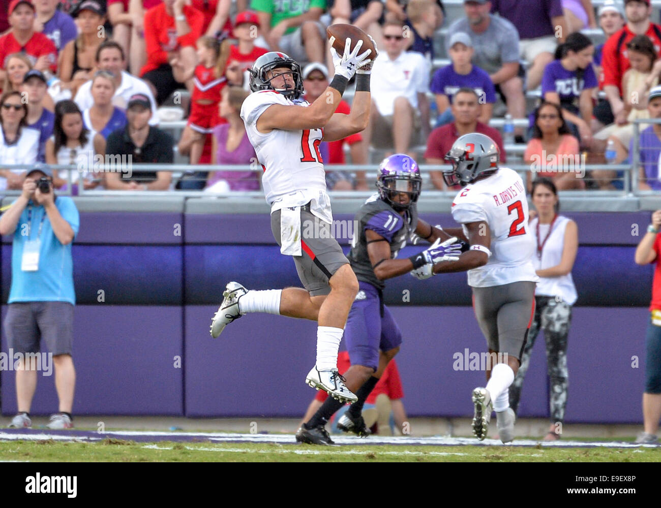 October 25th, 2014: .Texas Tech Red Raiders wide receiver Ian Sadler (12) catches a pass inside the 10 yd of an NCAA football game between the Texas Tech Red Raiders and the TCU Horned Frogs at Amon G. Carter Stadium in Fort Worth, Texas. Stock Photo