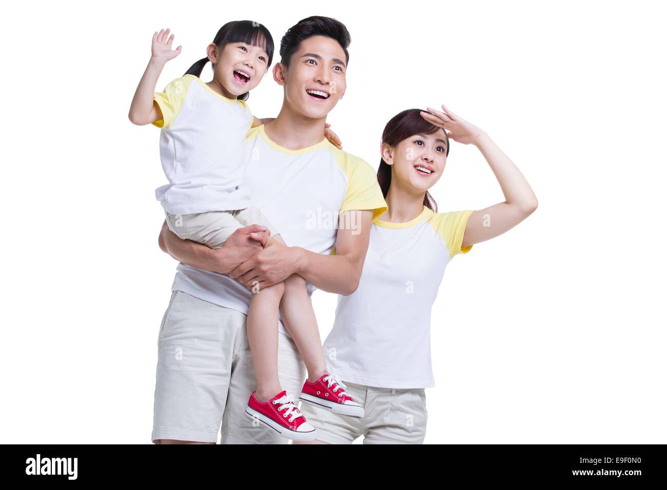 Happy young family Stock Photo - Alamy