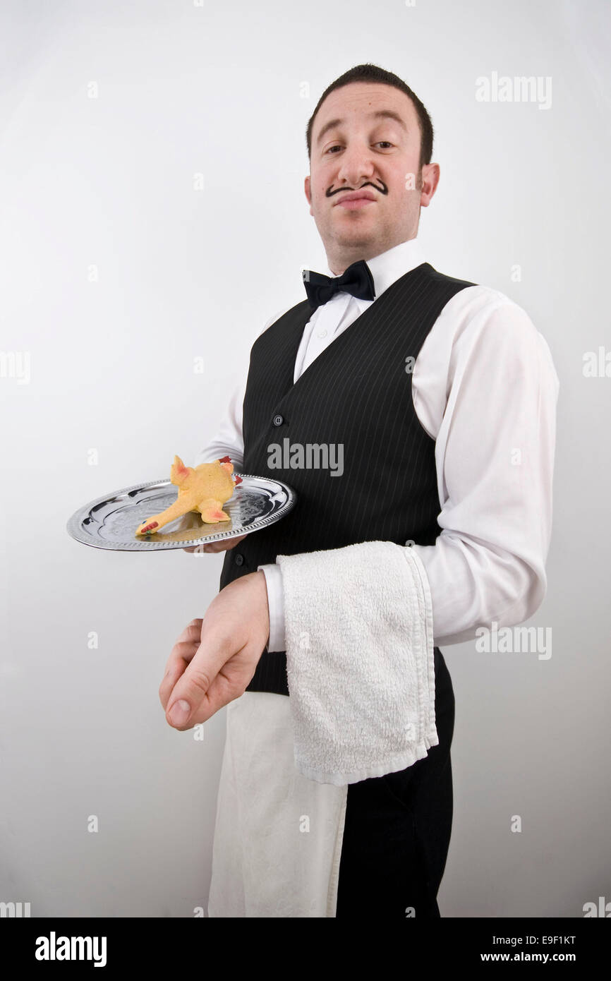 a man dressed in a funny costume as a french snobby restaurant waiter Stock  Photo - Alamy