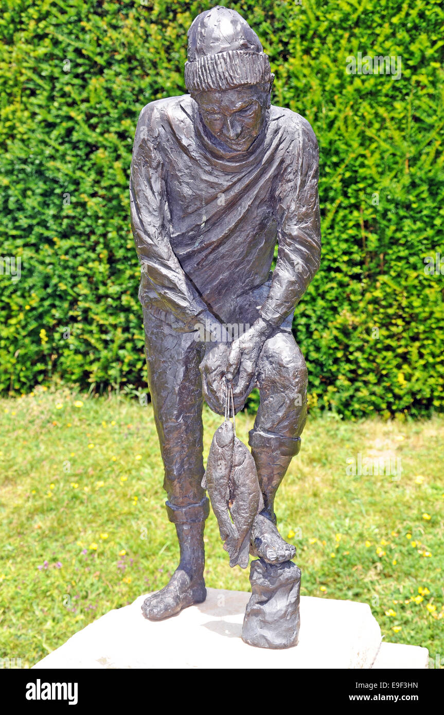 Bronze fisherman statue on a plinth, intended as a garden ornament