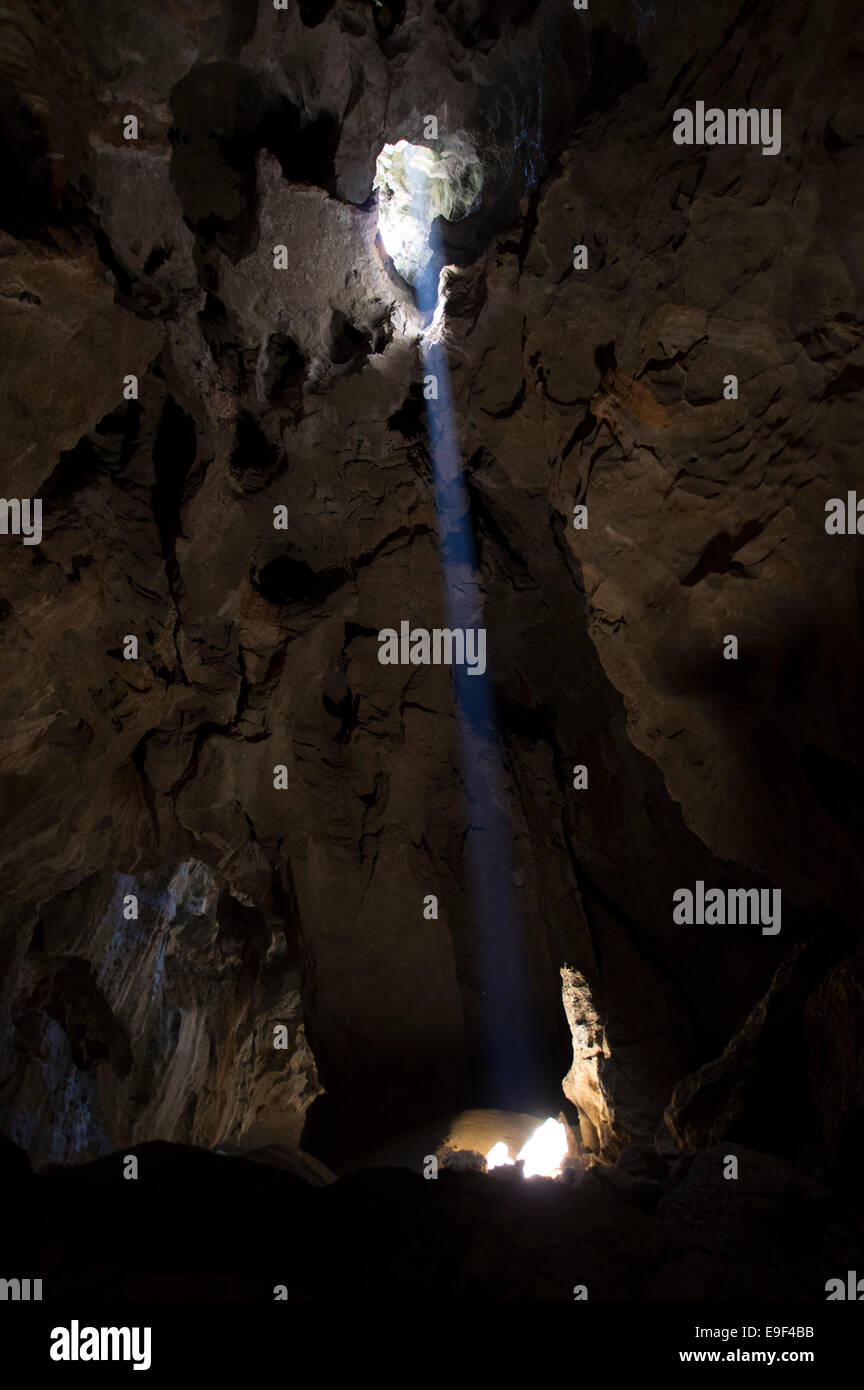 A beam of sunlight in the cathedral cave in ankarana national park Madagascar Stock Photo