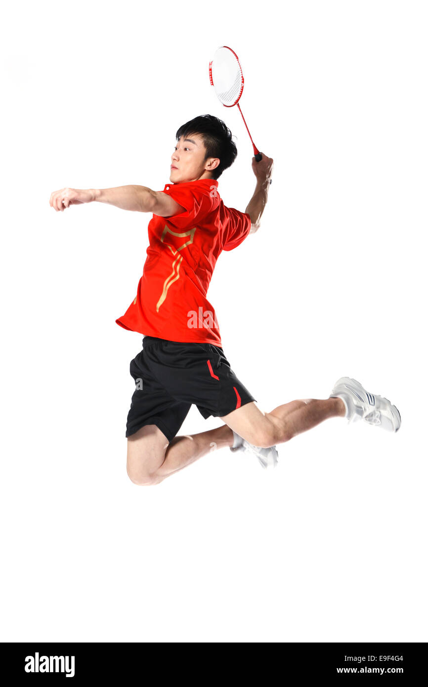 Male athletes playing badminton Stock Photo