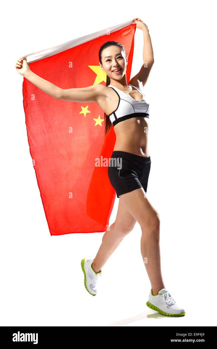 Women athlete holding flag Cut Out Stock Images & Pictures Alamy
