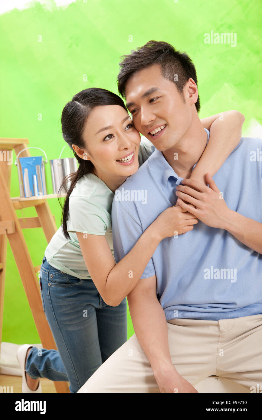 Young happy couple paint hi-res stock photography and images - Alamy