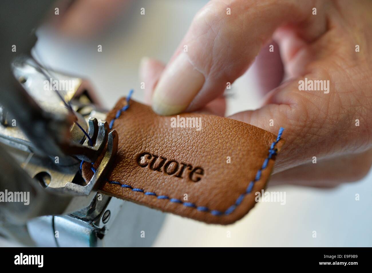 Exclusive: The artist and designer Paola Ezra crugnale paints works of art that are incorporated on handbags and wallets of the company 'Cuore'. The handbags are made in a combination of art and craft. The painted on canvas works by the artist are digitized and printed on the finest Vachette leather. Germany, 21st. October, Photo: Frank May Stock Photo