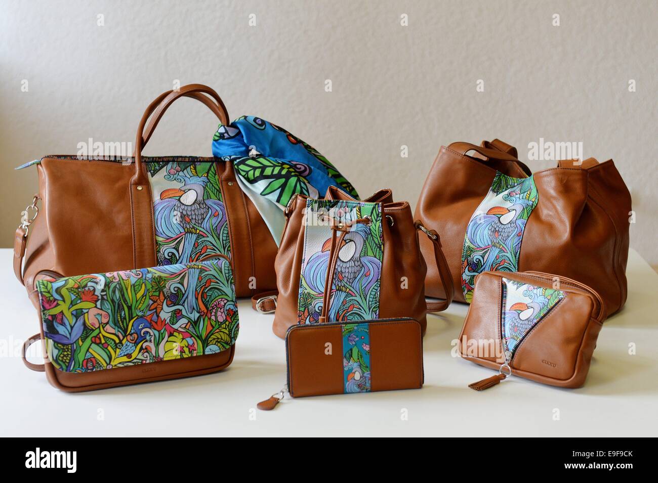 Exclusive: The artist and designer Paola Ezra crugnale paints works of art that are incorporated on handbags and wallets of the company 'Cuore'. The handbags are made in a combination of art and craft. The painted on canvas works by the artist are digitized and printed on the finest Vachette leather. Germany, 21st. October, Photo: Frank May Stock Photo