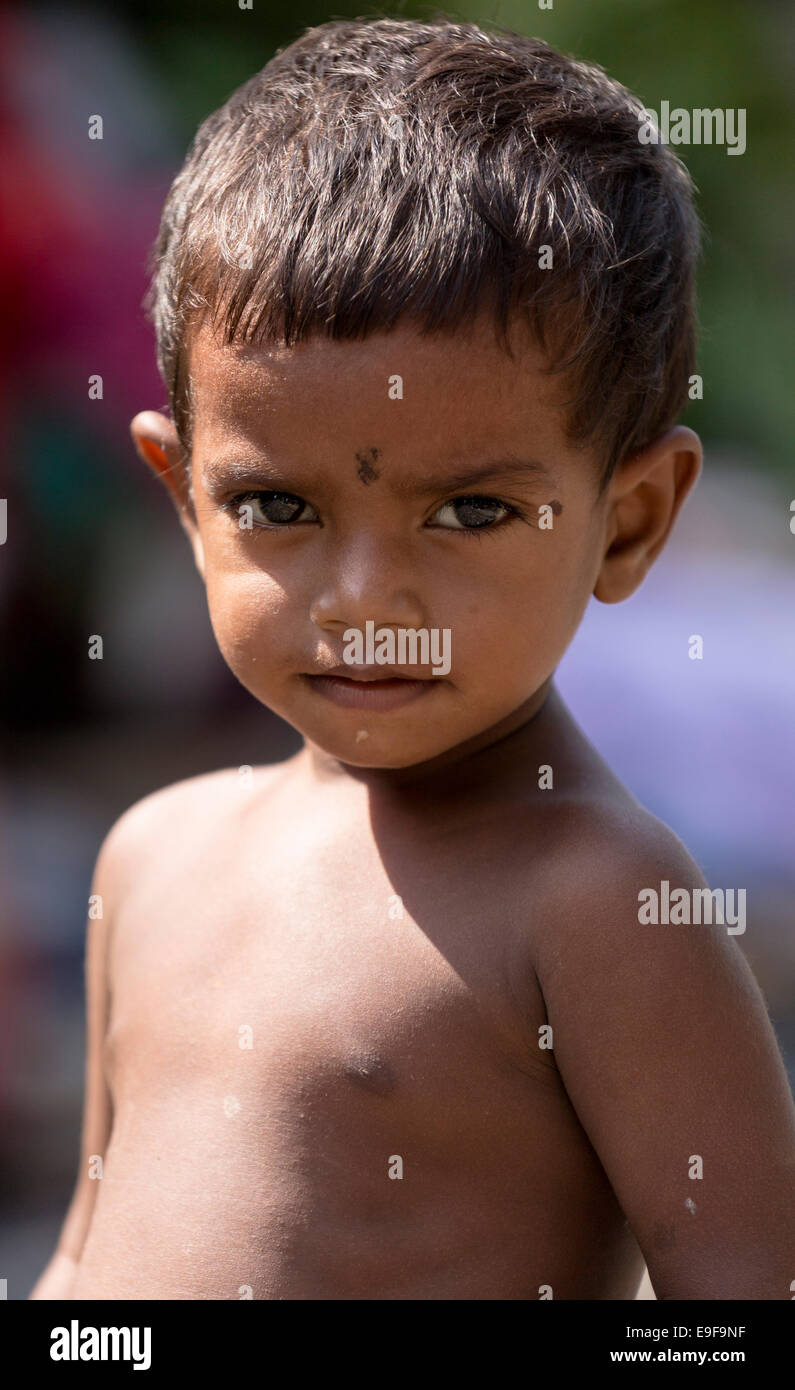 Portrait of child living in the slums of Northern Kolkata, West Bengal, India Stock Photo