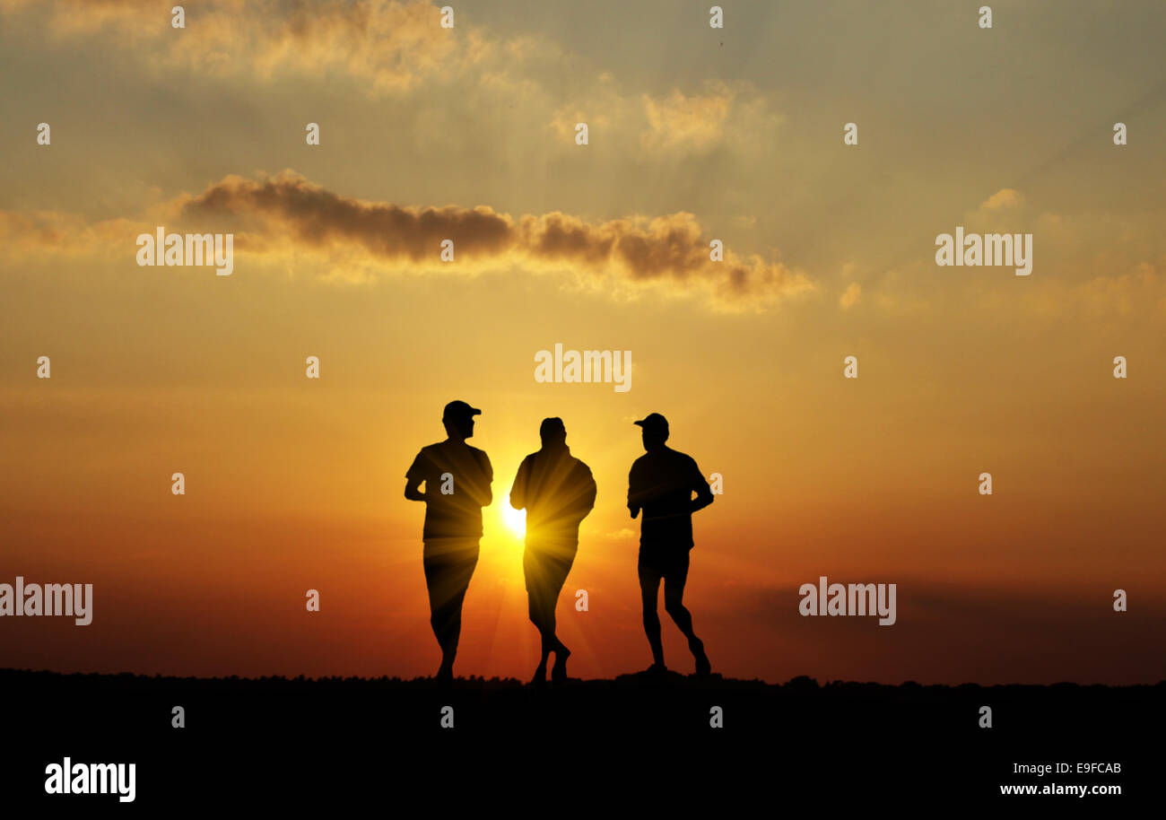 Black silhouette of running men Stock Photo - Alamy