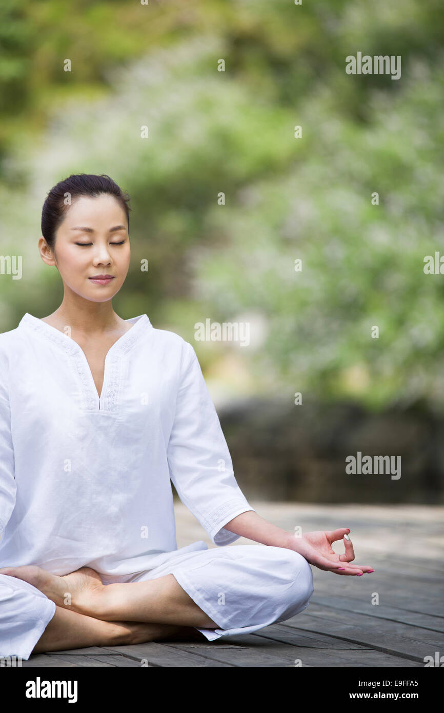 Young woman in meditation Stock Photo Alamy