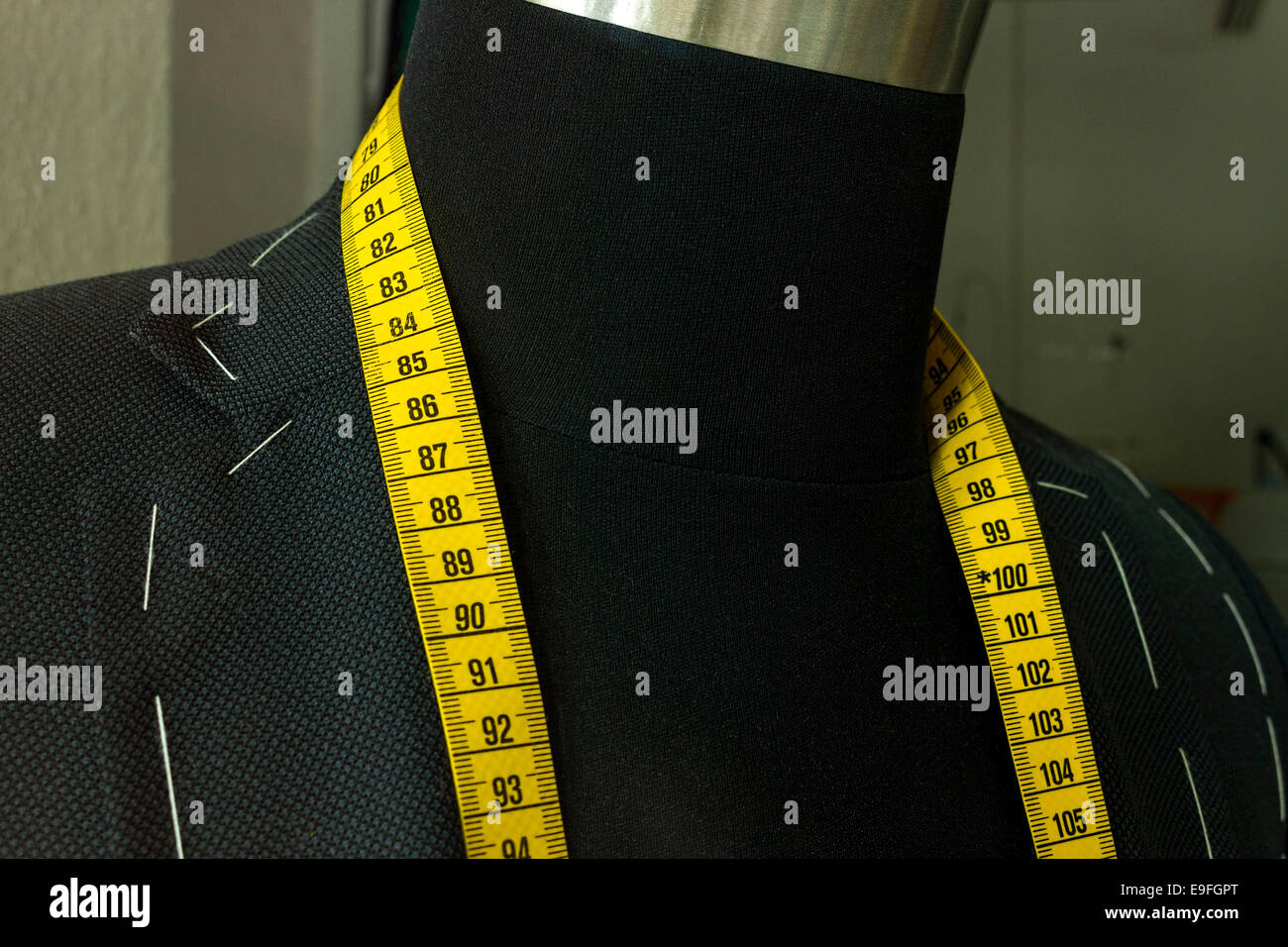 Tailors Tape around the neck of a Tailors Dummy ( mannequin) Stock Photo