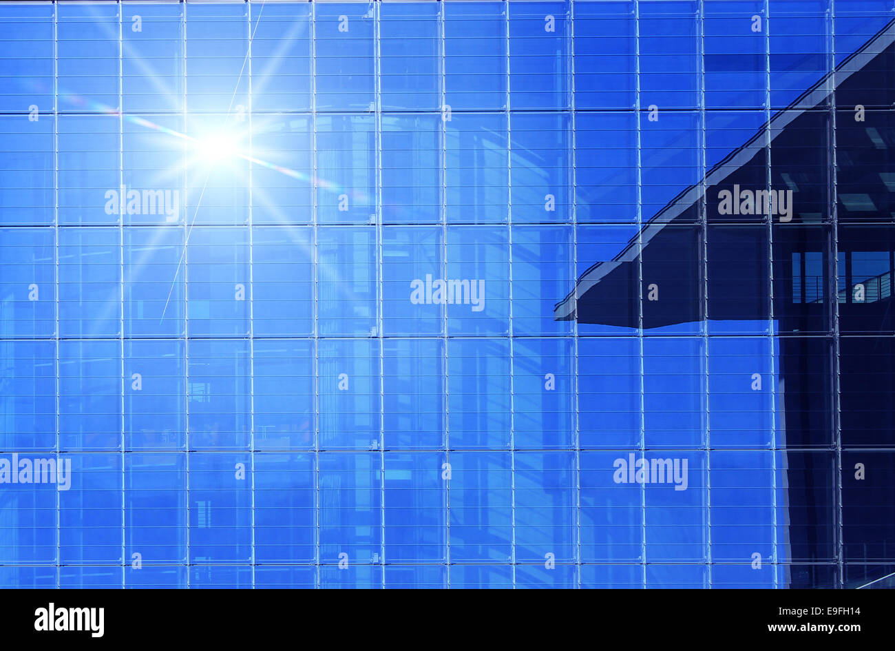 Office building details reflecting, blue sky Stock Photo - Alamy
