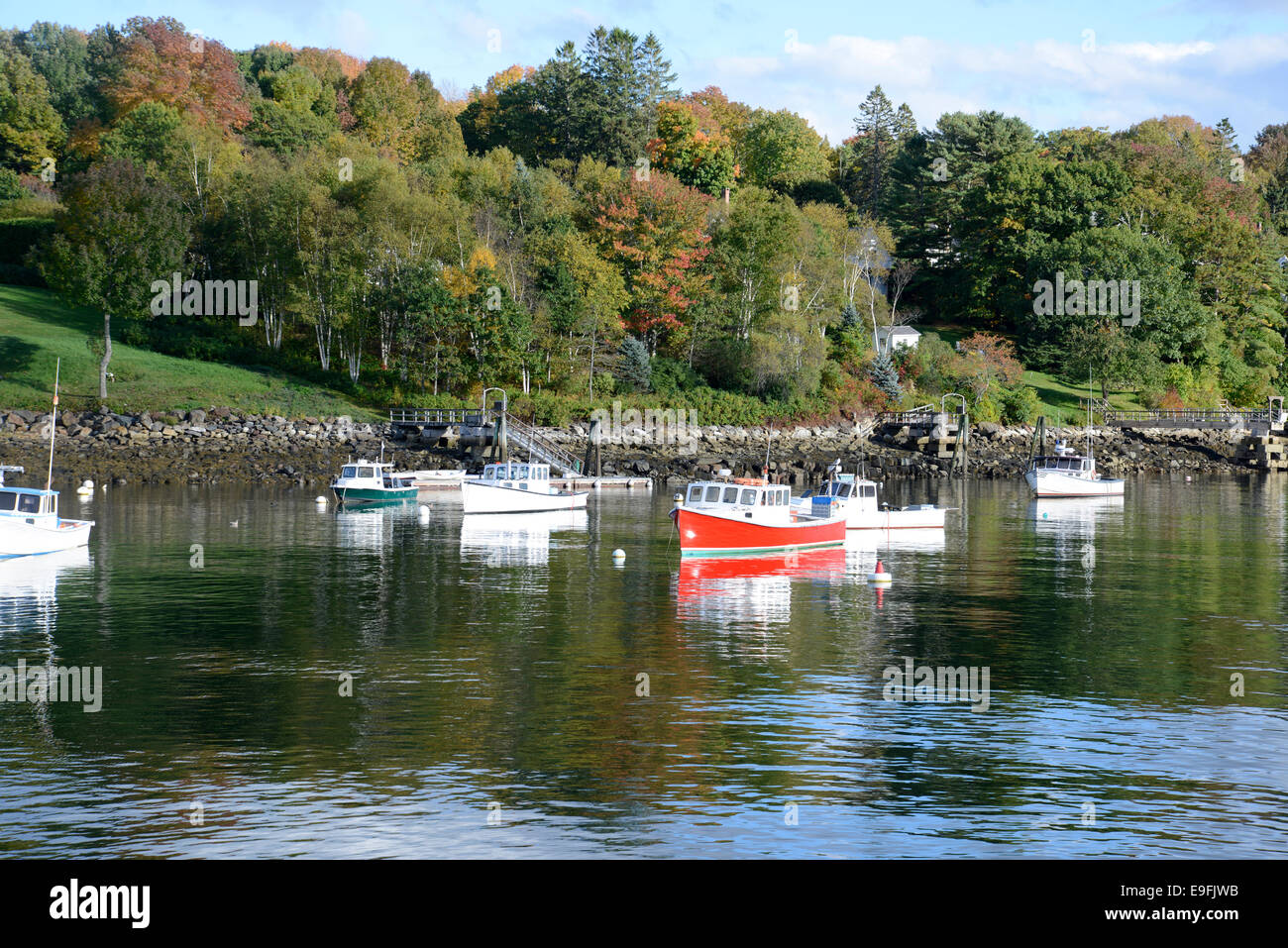 many small fishing boats docked in the Rockport Marine Harbor near
