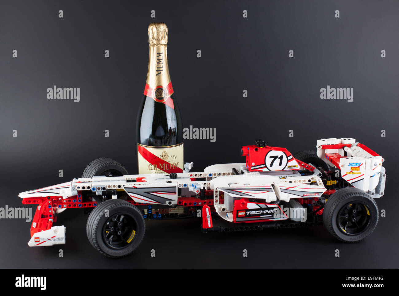 LEGO Technic Grand Prix Racer model with bottle of Champagne G.H.Mumm Brut  Cordon Rouge on black background Stock Photo - Alamy