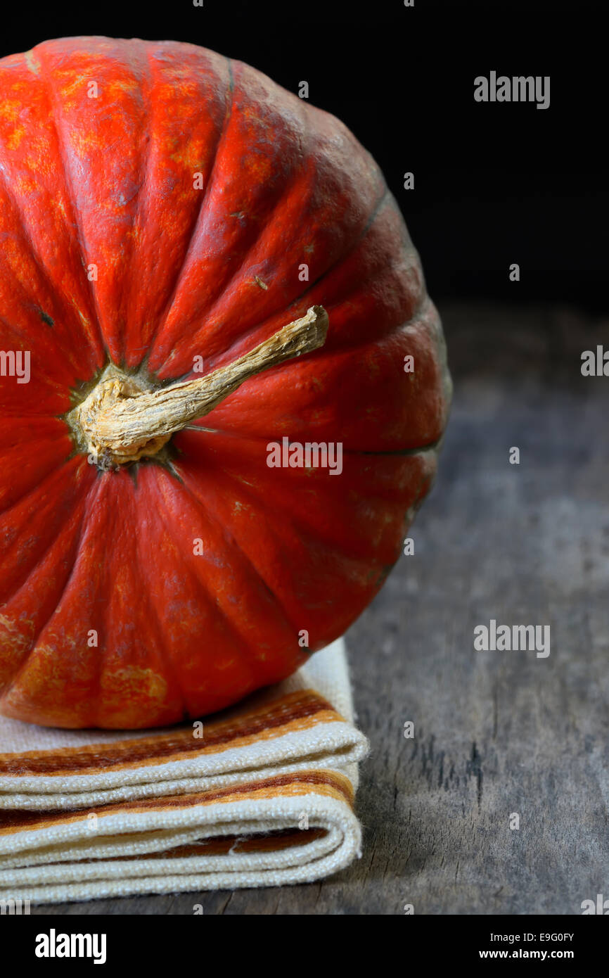 details of pumpkin on wooden background Stock Photo - Alamy