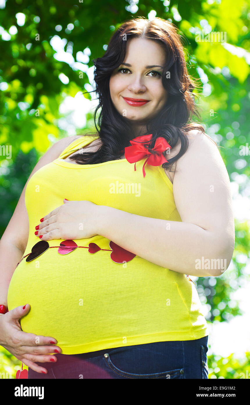 Pregnant woman relaxing garden hi-res stock photography and images - Alamy