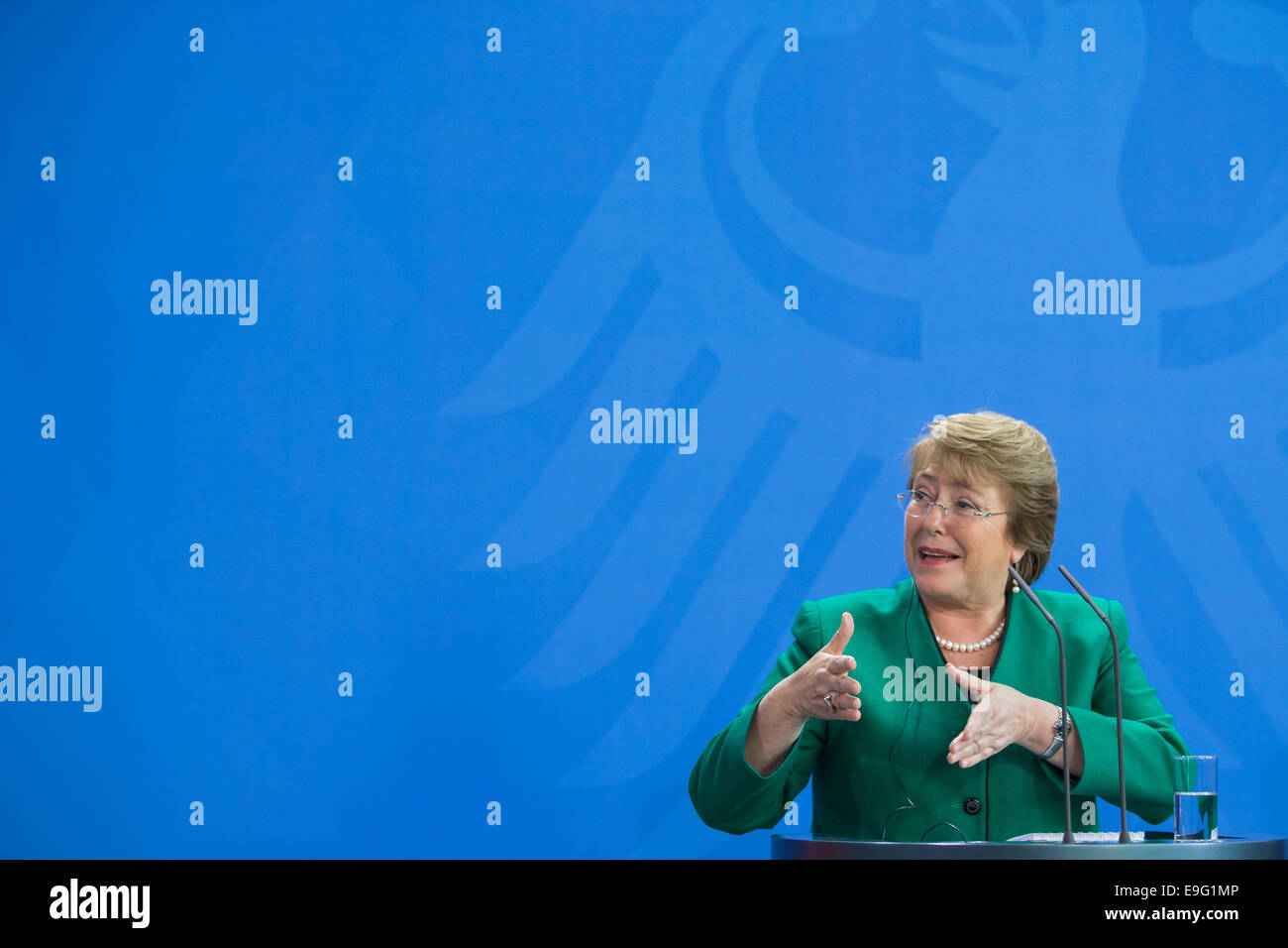 German Chancellor Angela Merkel and President of the Republic of Chile, Michelle Bachelet give a joint press conference after the meeting with  topics like the bilateral relations, the cooperation in the fields of economy, energy, science and research as well as in global issues as well the current situation in Latin America and the international crises. At the German Chancellery on October 27th, 2014 in Berlin, Germany. / Picture: Michelle Bachelet, President of the Republic of Chile. Stock Photo