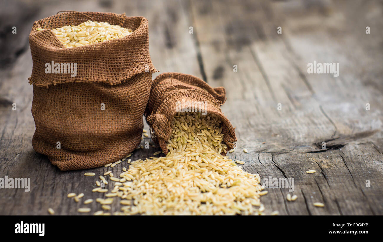 Brown rice bags Stock Photo Alamy
