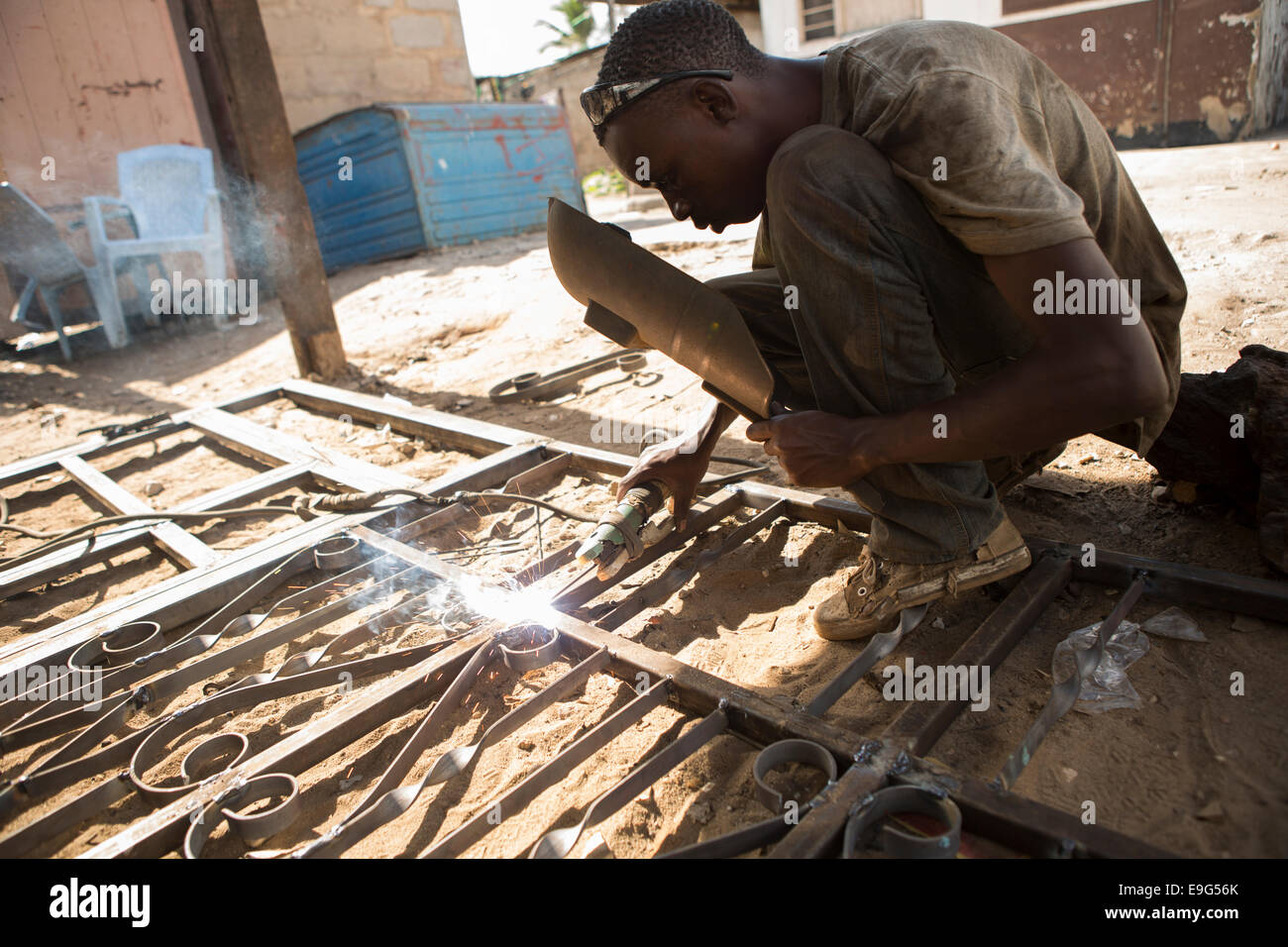 Welder at a workshop in Dar es Salaam, Tanzania, East Africa. Stock Photo