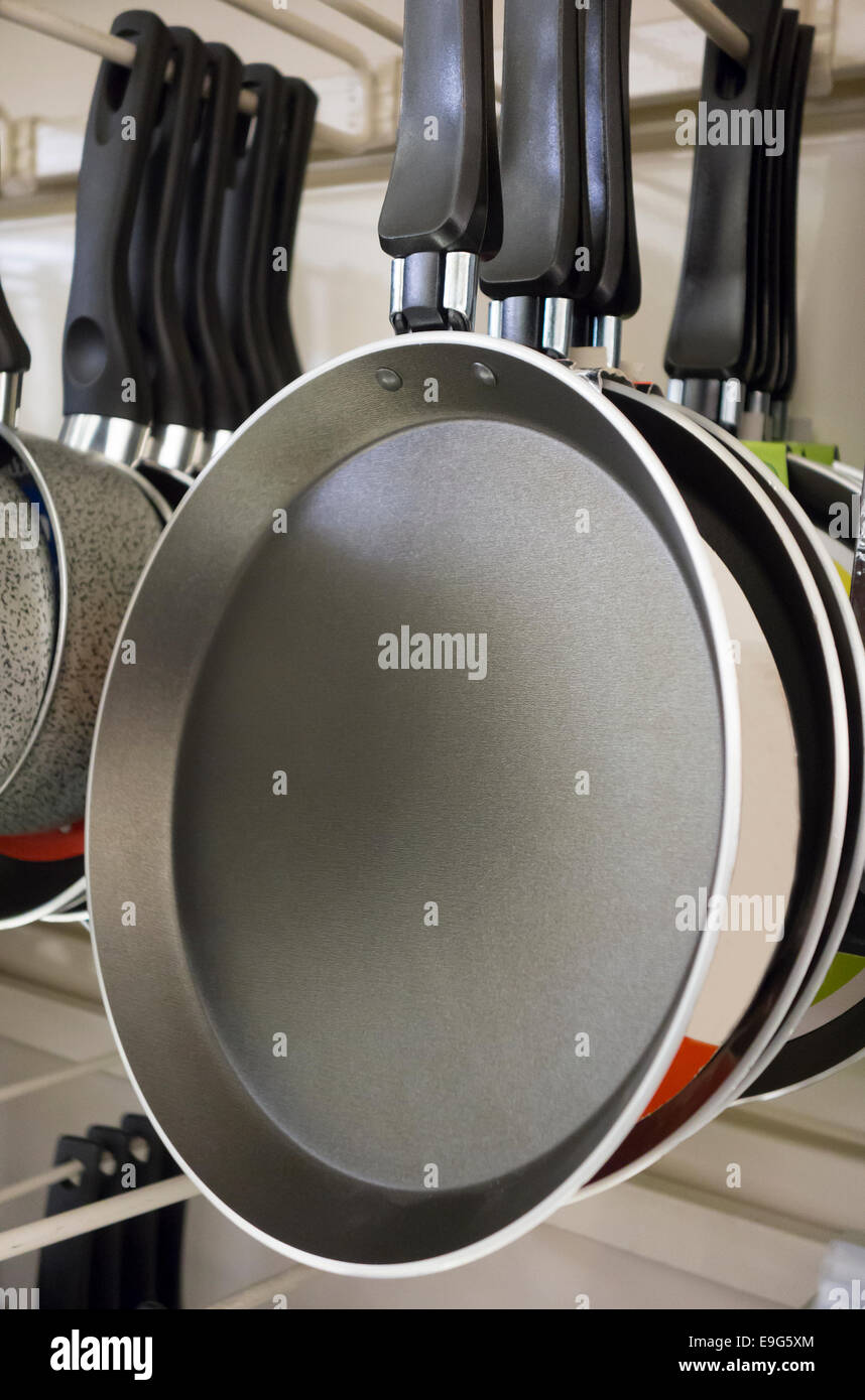 New pans in store Stock Photo Alamy