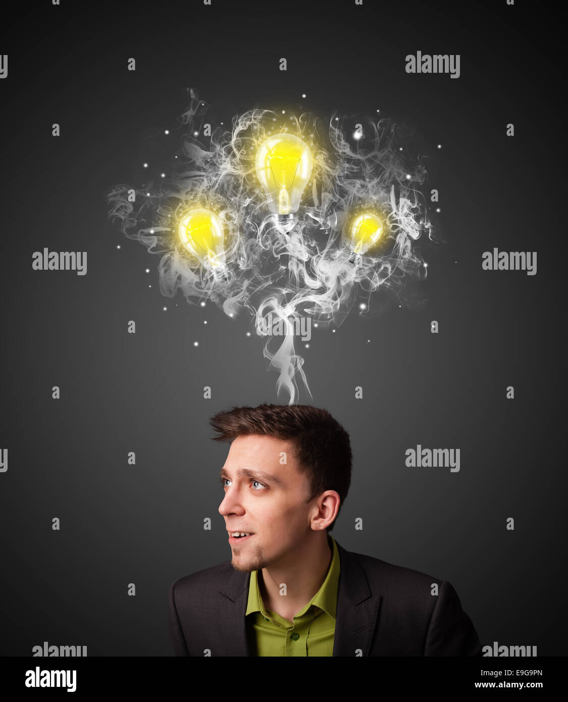 Thoughtful businessman with smoke and lightbulbs above his head Stock