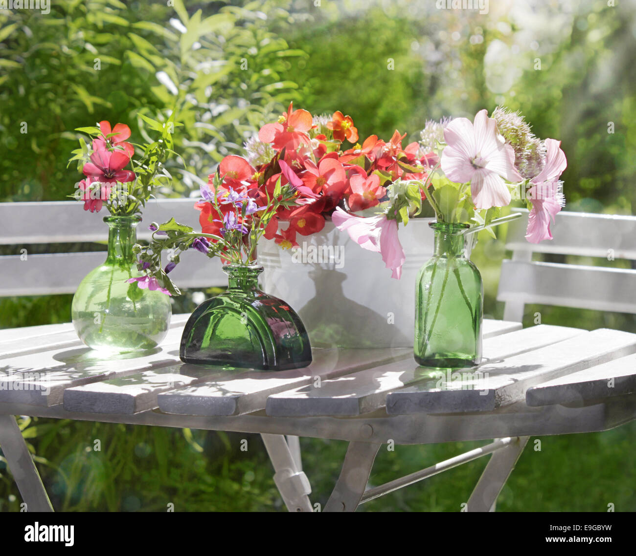 garden flowers on a garden table Stock Photo