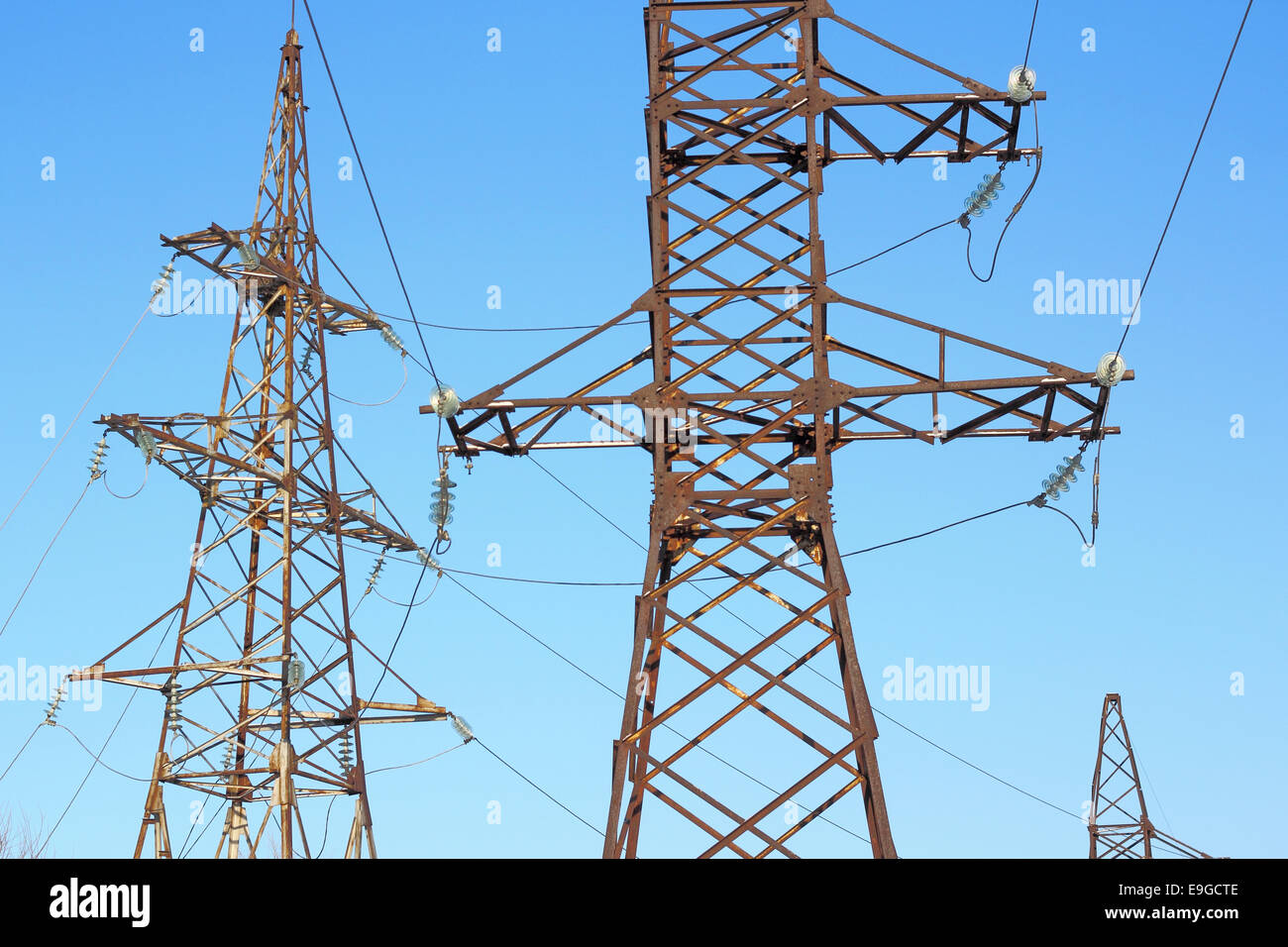 high voltage post against the blue sky Stock Photo - Alamy
