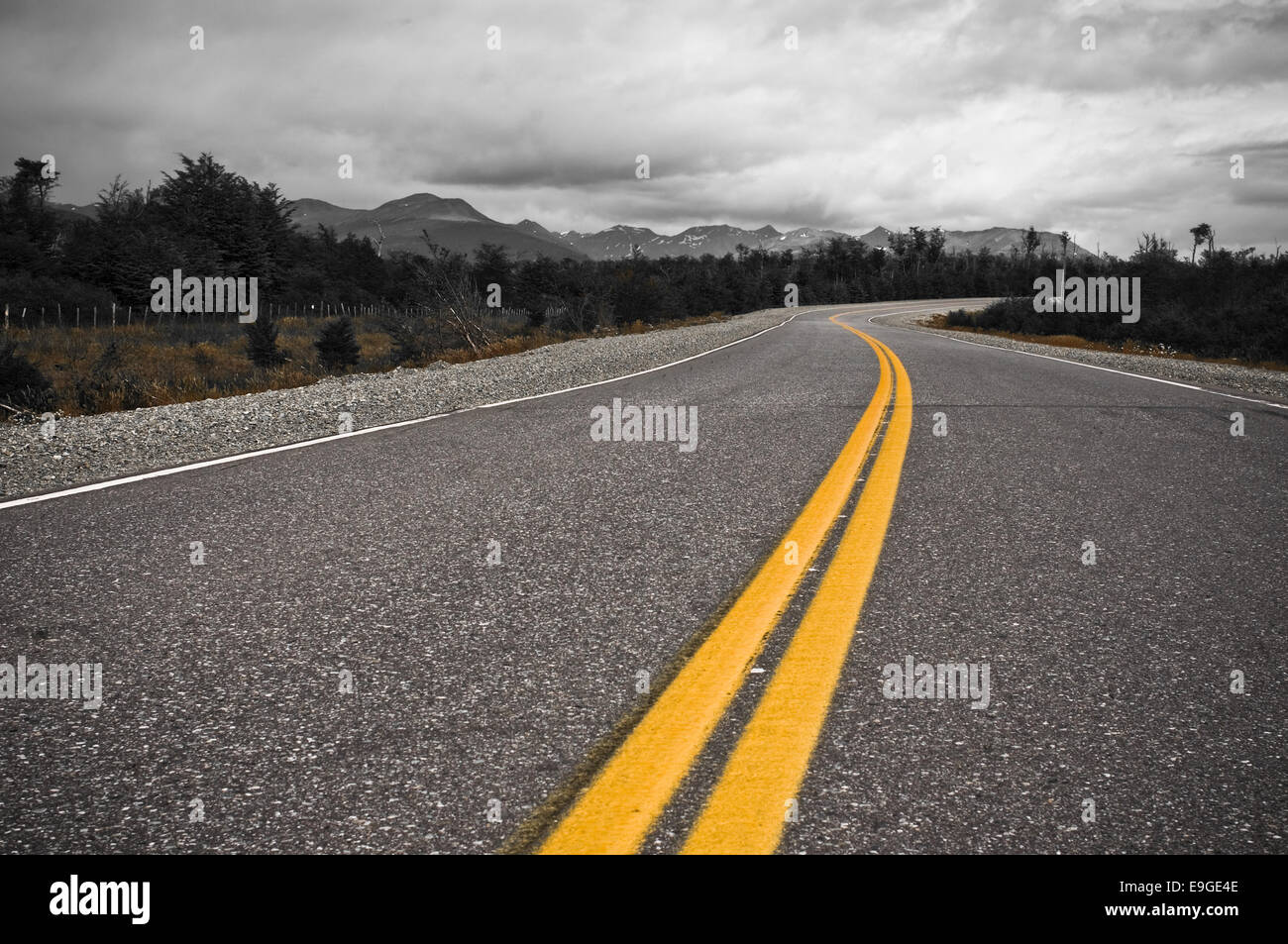 yellow dividing line of highway Stock Photo