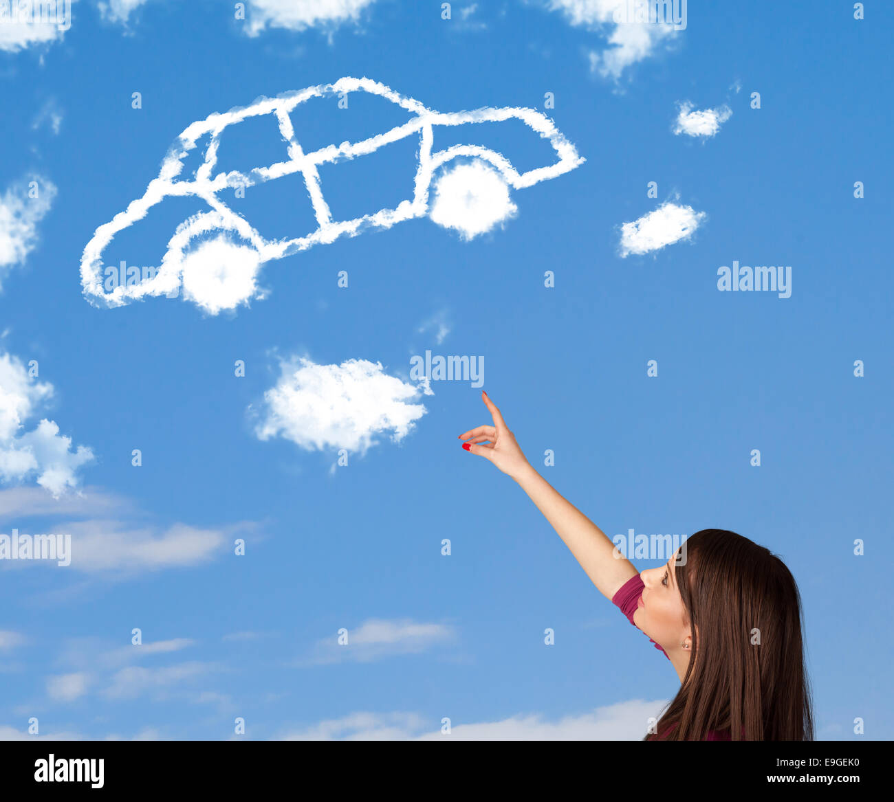 Young girl looking at car cloud on a blue sky Stock Photo - Alamy