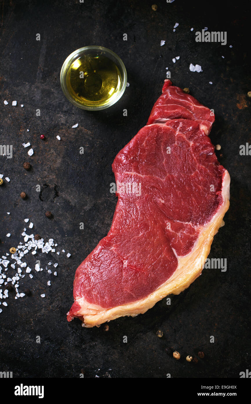 Raw steak with olive oil Stock Photo Alamy