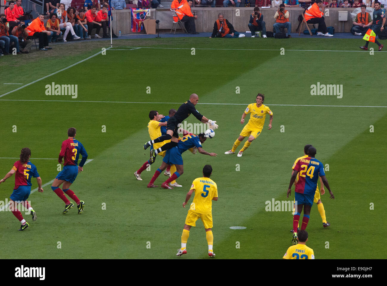 BARCELONA - MAY 9: The goalkeeper catches the ball on May 9, 2009 in Barcelona, Spain. F.C Barcelona against Villarreal. Stock Photo