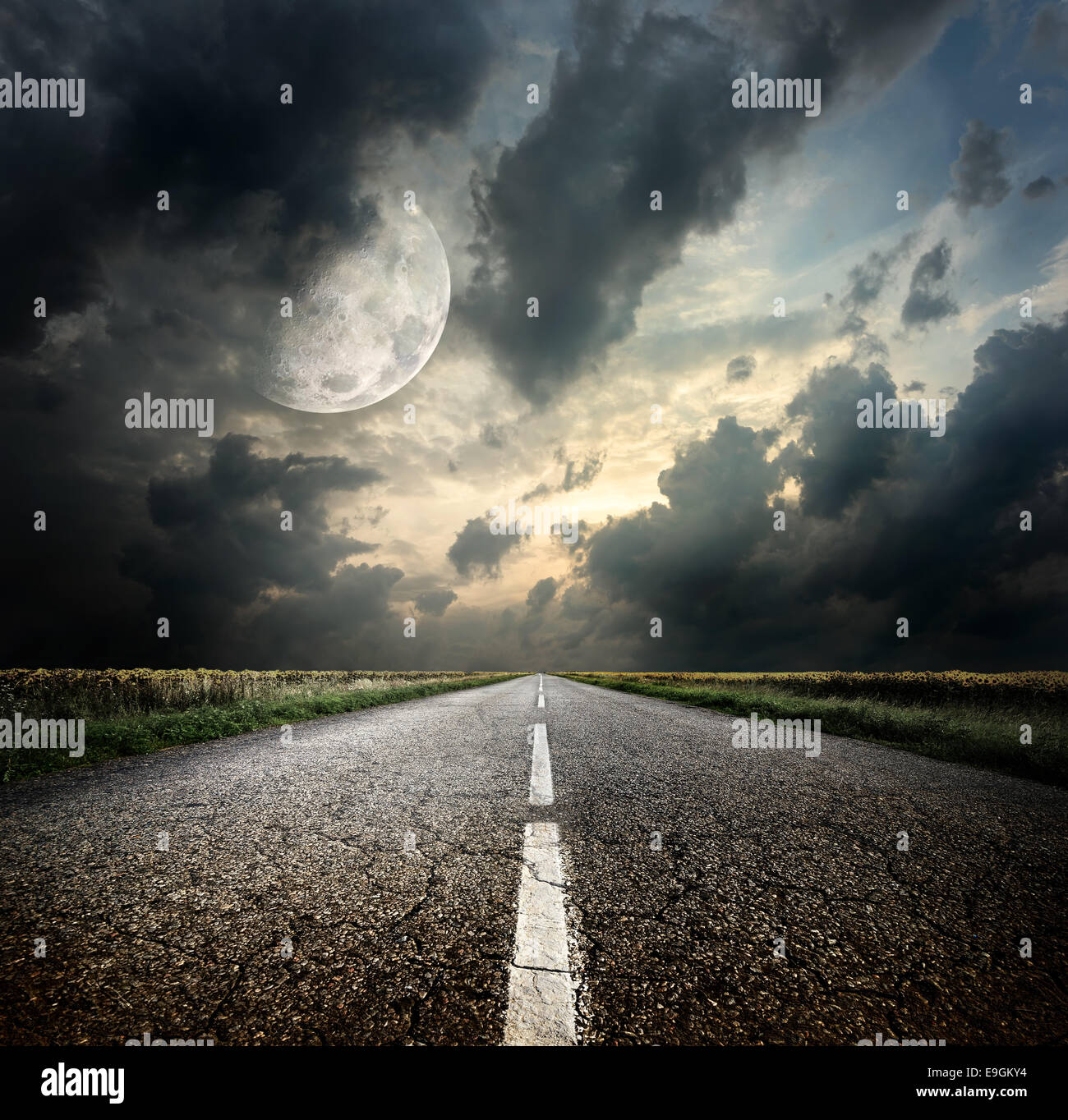 Highway and the moon. Elements of this image furnished by NASA Stock Photo