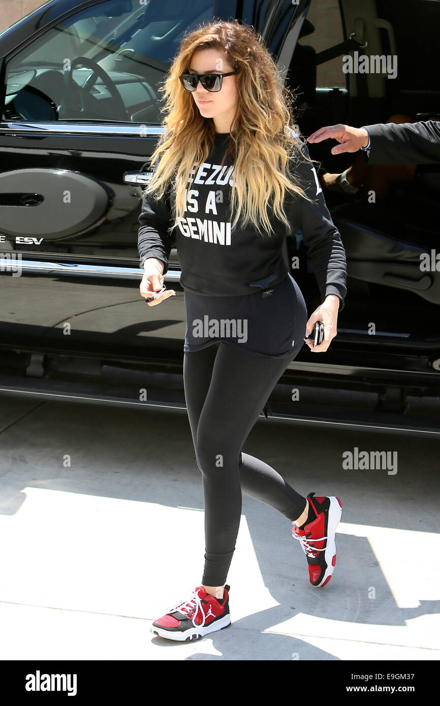 Nike Air Jordans Black leggings Yeezus is a Gemini Jumper Sunglasses  paparazzi Stock Photo - Alamy