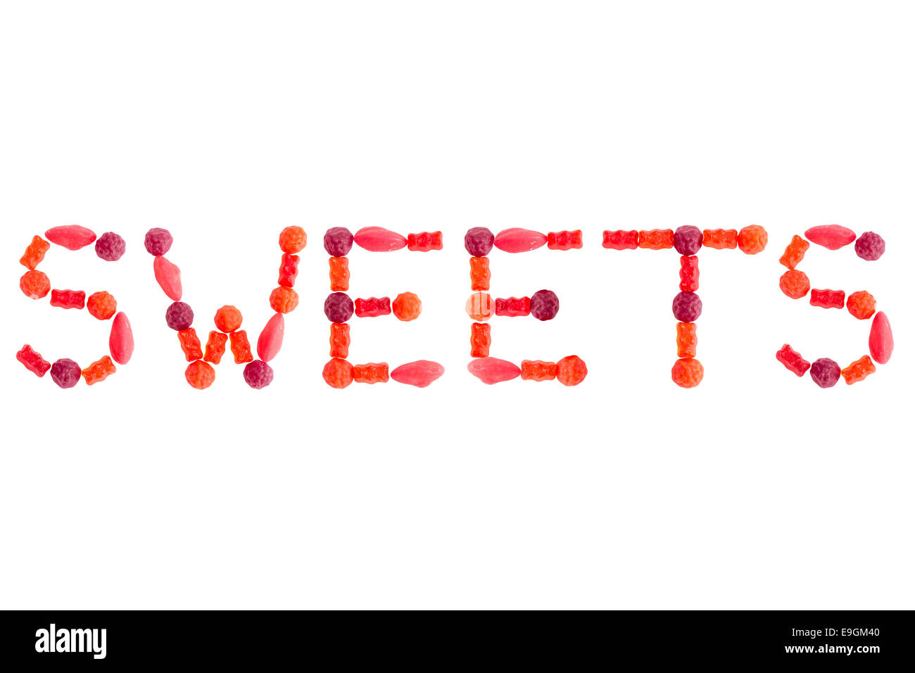 Word SWEETS made of red sugary candies, isolated on white background