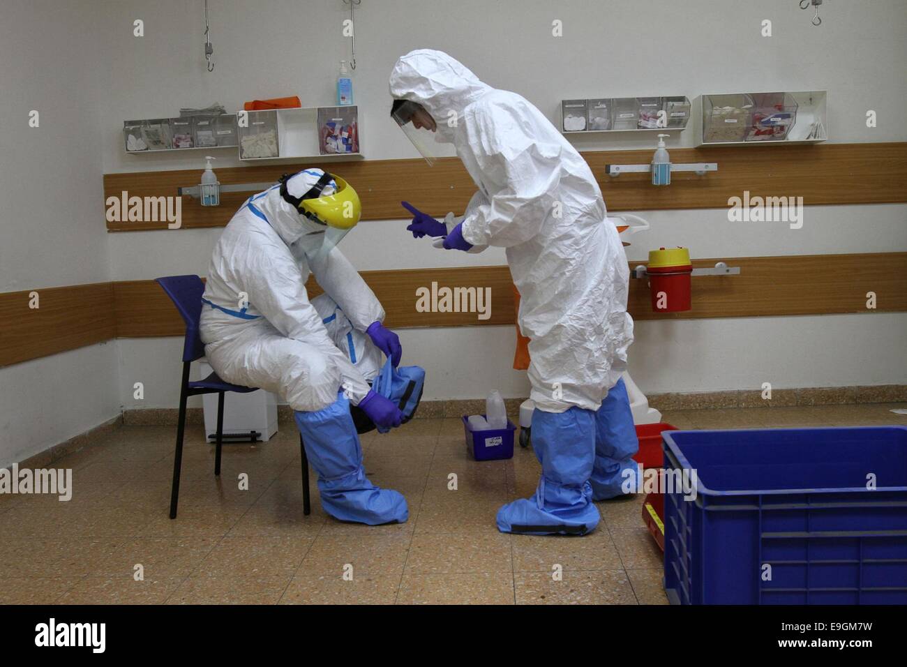 Jerusalem, Israel. 27th Oct, 2014. Israeli emergency workers attend a hospital exercise to treat 'patients infected with Ebola' at Kaplan hospital in Rehovot near Tel Aviv, Israel, on Oct. 27, 2014. Credit:  Gil Cohen Magen/Xinhua/Alamy Live News Stock Photo